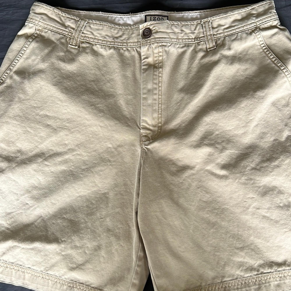 Tan IZOD cargo shorts. Size W38.